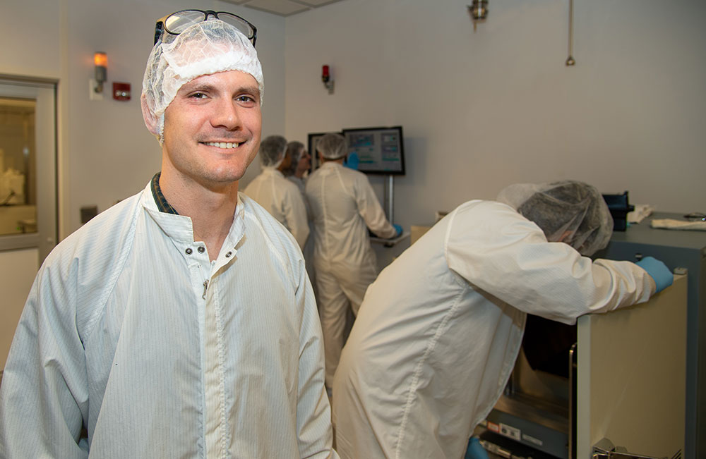 Student in Lab facing camera