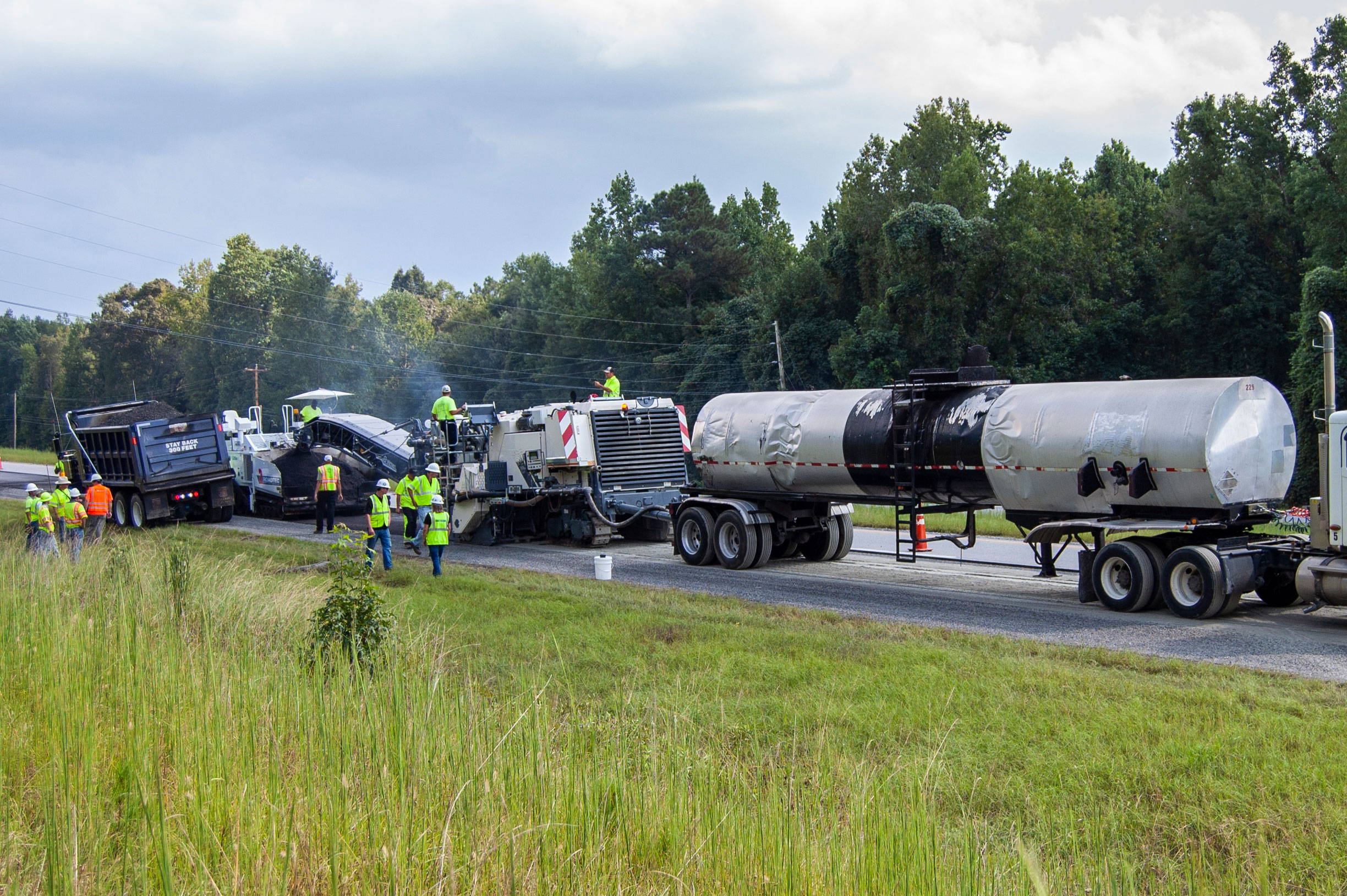 Cold in-place recycling involves the same process as cold central plant recycling except that it is performed in-place by a train of equipment.